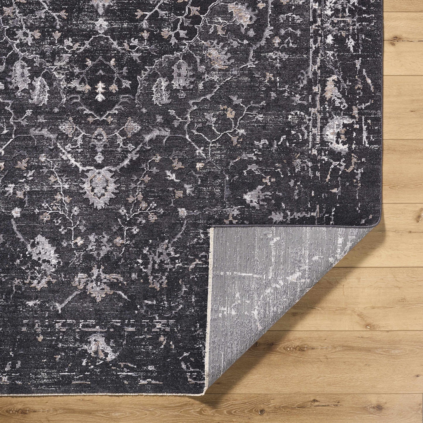 Corina Black Area Rug